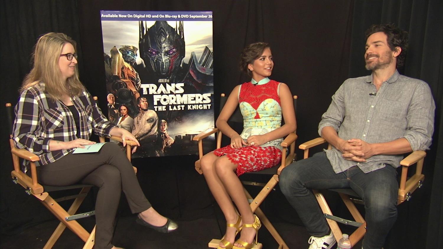 Transformers: The Last Knight's Santiago Cabrera and Isabella Moner on Stunts and Frekaing Out Transformers: The Last Knight's Santiago Cabrera and Isabella Moner on Stunts and Frekaing Out